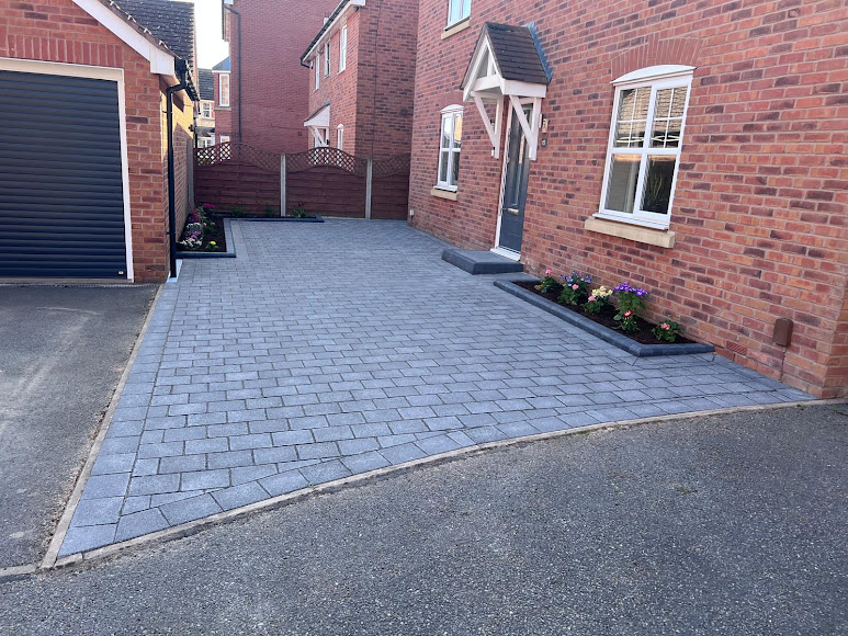 Completed grey block paved driveway